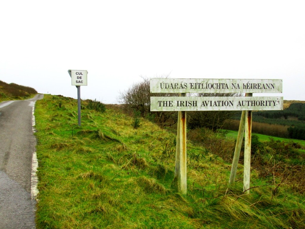 irish aviation authority signboard at road leading up to mount gabriel