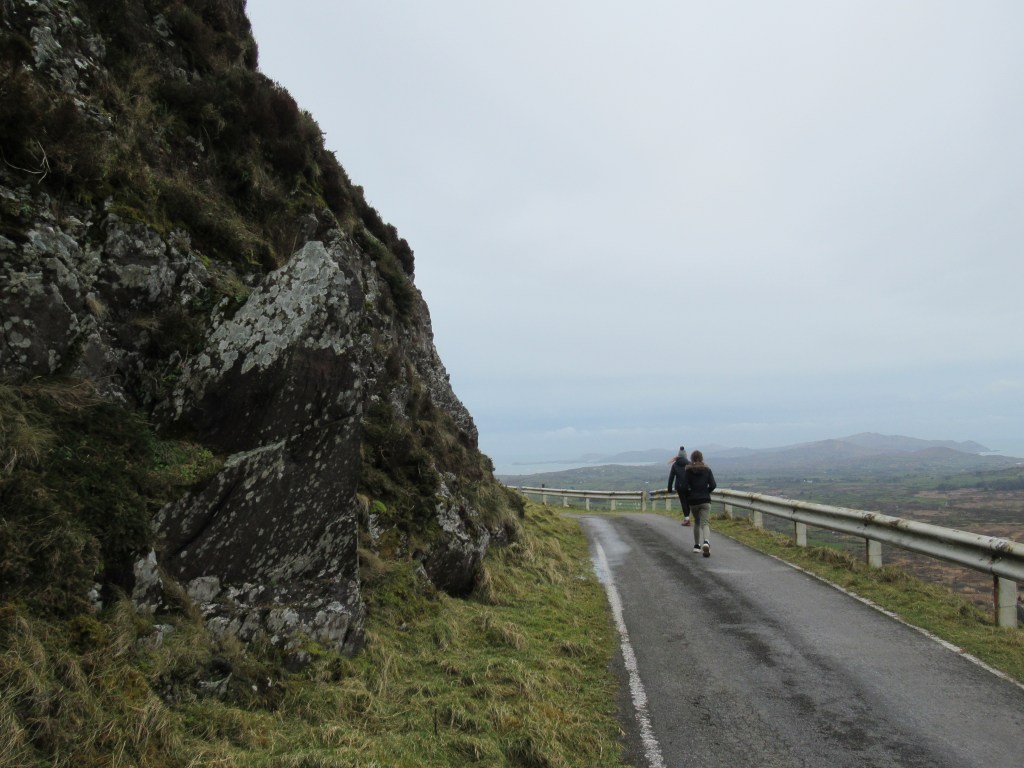 kids walking the road up to mount gabriel in west cork 