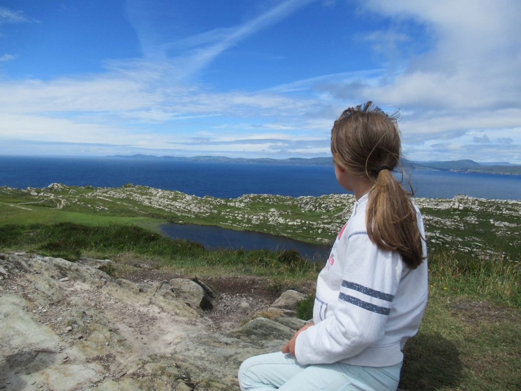 Child taking a rest on the LIghthouse Loop on the Sheep's Head Way.